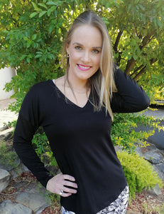 Black V- Neck long sleeve top with bat sleeves